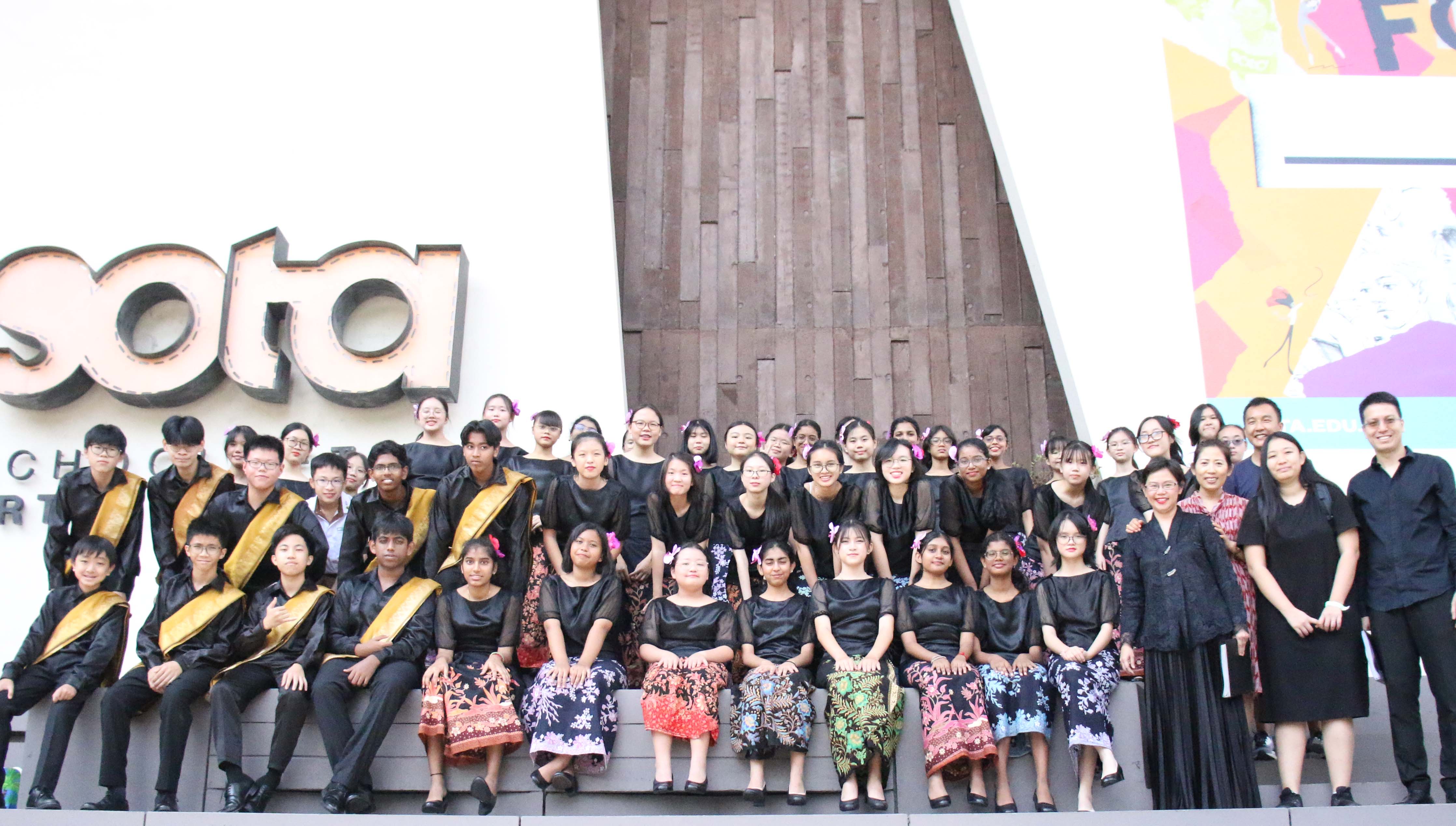 BVSS Choir members and teachers posing for a group photograph during their Singapore Youth Festival experience.